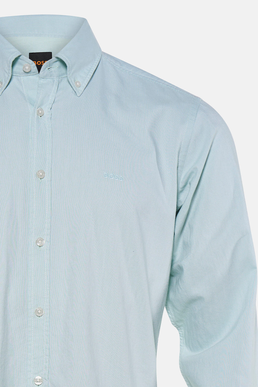 Chemise bleu clair de HUGO BOSS ORANGE avec col boutonné et logo BOSS brodé sur la poitrine.