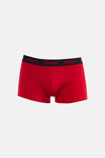 Boxer short rouge de HUGO, avec une ceinture noire ornée de logos rouges.