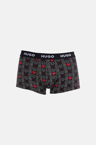 Boxer multicolore de HUGO, avec motif "HUG" répété et cœurs rouges sur tout le boxer.