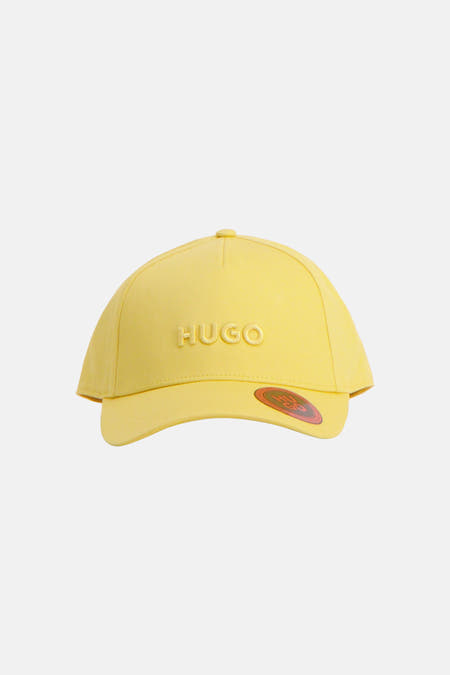 Casquette jaune de HUGO, avec fermeture réglable à l'arrière.