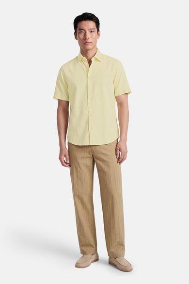 Chemise verte à manches courtes de HUGO BOSS ORANGE, avec fermeture boutonnée et texture subtile.