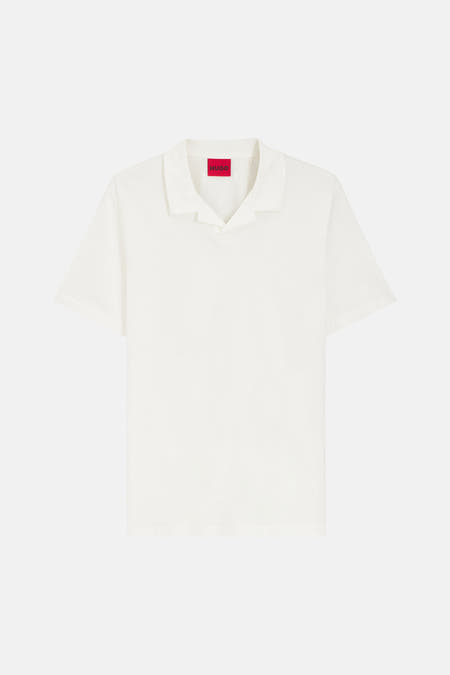 Polo blanche à manches courtes de HUGO, design uni avec un col ouvert.