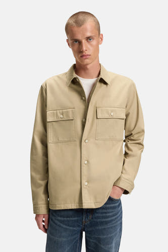 Chemise beige à longues manches de HUGO, avec poches poitrine et et bouton.