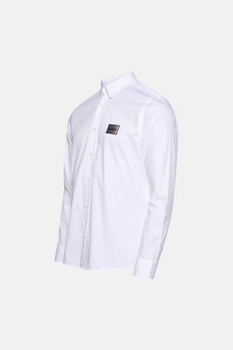 Chemise blanche à manches longues HUGO, avec un écusson logo sur la poitrine.
