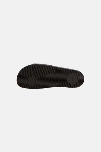 Tongs noirs HUGO avec un profil hexagonal sur la semelle.