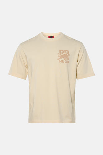T-shirt écru à manches courtes de HUGO, avec imprimé graphique de taureau de couleur sable sur la poitrine.