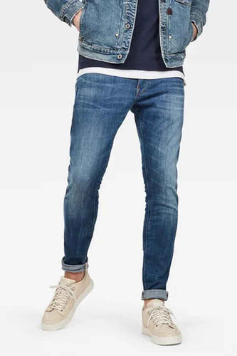 Jean skinny en denim bleu moyen de G-Star RAW, avec des poches arrière et des jambes relevées.