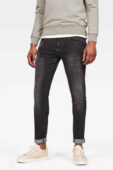 Jean skinny gris G G-Star RAW, avec une décoloration et une coupe ajustée.