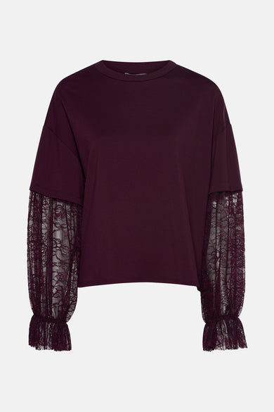 Gilet de Bordeaux de Terra di Siena avec des manches longues en tissu évasé et des plis.