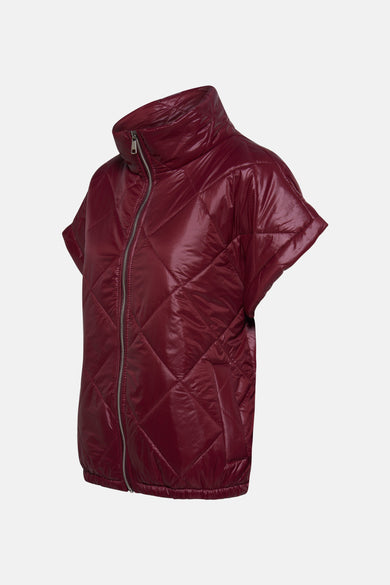 Gilet rouge de Terra di Siena avec motif de carreaux brodé et col haut.