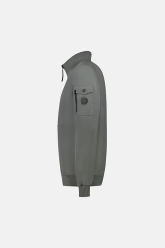 Veste courte verte de Cars, avec une poche poitrine et un col montant, vue de profil.