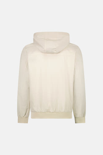 Manteau court beige de Cars, avec manches longues, capuche et poignets élastiques.