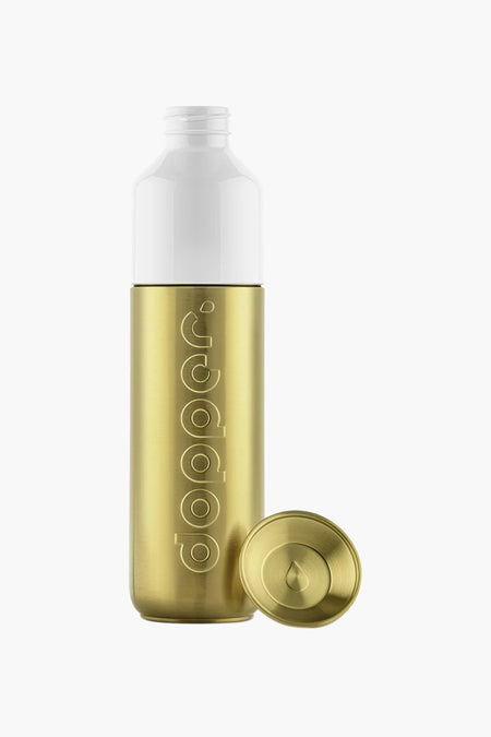 Bouteille à boire en or de DOPPER, avec un dessus blanc et une bouchon en or séparé.