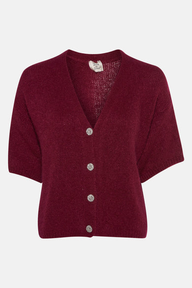 Gilet rouge de Terra di Siena avec des manches courtes et des boutons décoratifs.