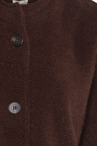 Veste brune de Terra di Siena avec une texture douce et deux boutons.