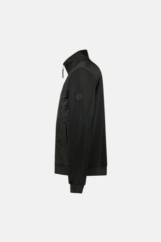 Manteau court noir de Cars, avec un devant doublé et une médaille sur la manche, en vue latérale.