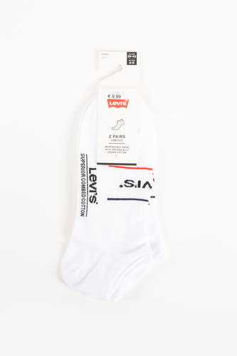 Chaussettes blanches de Levi's, avec des détails de logo et une coupe basse, emballées avec un étiquette de prix.