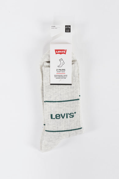 Chaussettes courtes grises Levi's® avec des rayures vertes et logo, dans leur emballage, vue de face