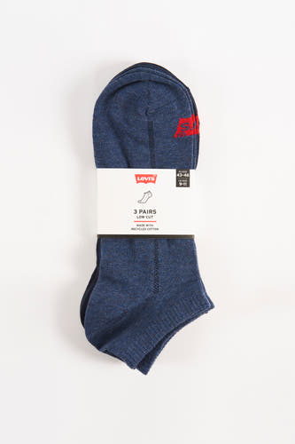 Chaussettes bleues de Levi's avec des accents rouges, emballées et prêtes à l'emploi.