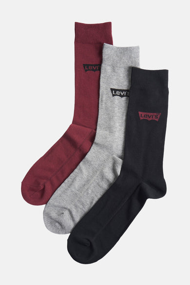 Chaussettes multicolores de Levi's avec des variantes rouges, grises et noires, présentées en pile.