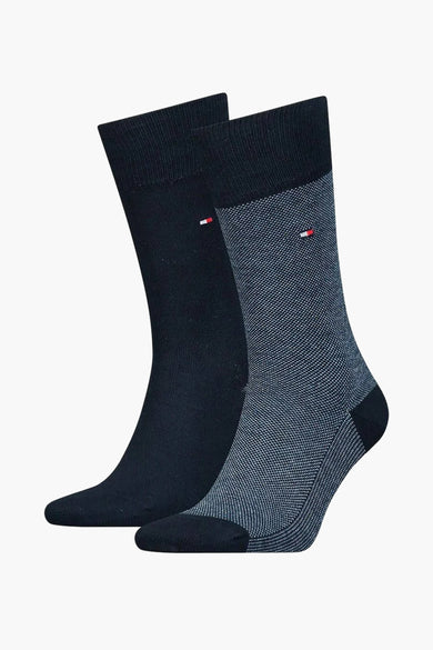 Chaussettes bleues de TOMMY JEANS, une version lisse et une version finement tissée avec le logo de la marque.