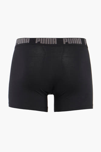 Boxers noirs PUMA, avec le nom de marque gris sur la ceinture.