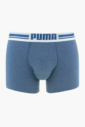 Boxer short en coton bleu de PUMA avec une ceinture élastique à rayures bleues et logo de la marque.