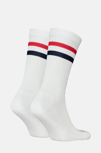 Chaussettes blanches de Levi's® Accessories, avec des rayures rouges et bleu marine au-dessus du genou.