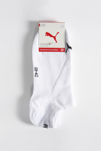 Chaussettes blanches de PUMA, emballées avec étiquette, en taille 39-42 et logo.