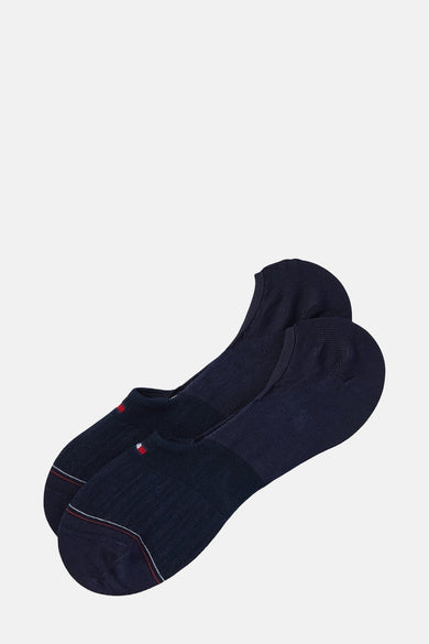 Chaussettes bleues de TOMMY JEANS, avec un petit logo et des accents rouge et blanc sur le dessus.
