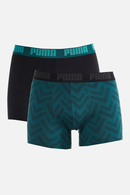 Boxer short bleu-vert de PUMA avec un motif géométrique en zigzag noir.