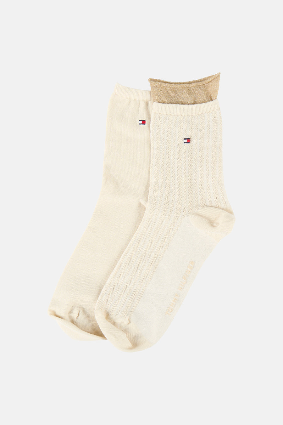 Chaussettes beiges de TOMMY JEANS, avec motif rayé et détails dorés.