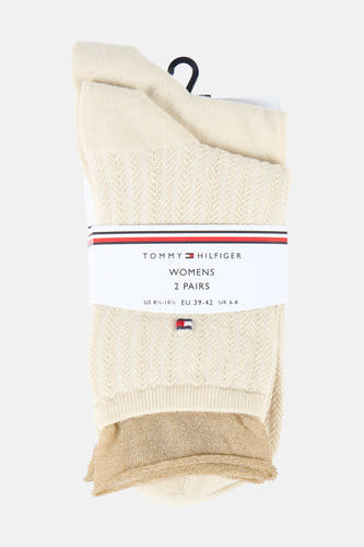 Chaussettes beiges pour femmes de TOMMY JEANS, avec un motif ajouré et des détails scintillants dorés sur le bord.