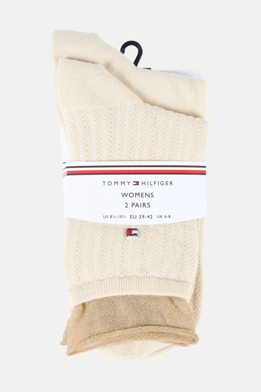 Chaussettes beiges pour femmes de TOMMY JEANS, avec un motif ajouré et des détails scintillants dorés sur le bord.