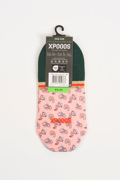 Chaussettes multicolores avec imprimé de fleurs roses et bord supérieur vert foncé de XPOOOS, dotées d'une semelle en silicone et d'un logo orange sur le pied.