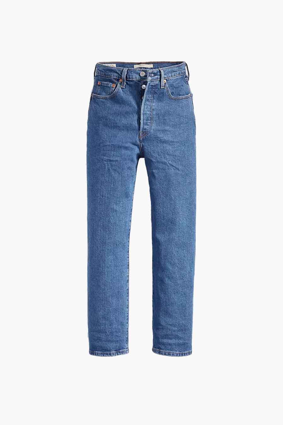 Jean droit en denim bleu de Levi's®, avec une fermeture à boutons et des poches classiques.