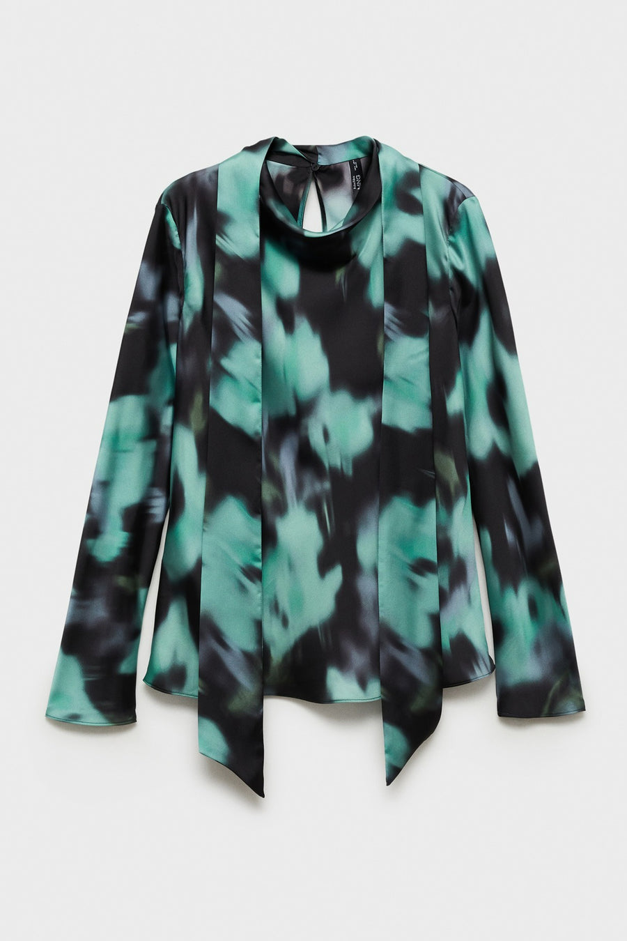 Blouse multicolore à longues manches de MANGO, avec un motif abstrait tacheté et un détail de cordon au col.