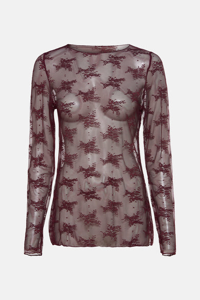 Blouse de Bordeaux à longues manches de Terra di Siena, avec un motif floral semi-transparent.