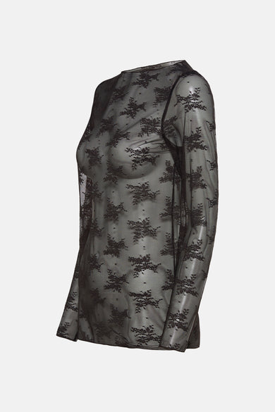 Blouse brune à longues manches de Terra di Siena, avec un motif floral et une texture transparente en dentelle.