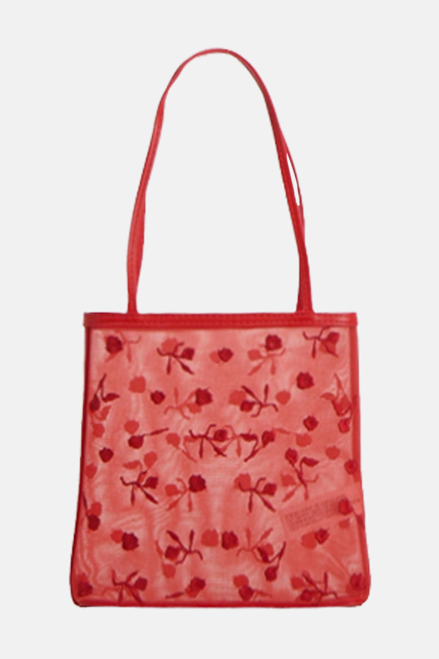 Rode tas met bloemenpatroon.
