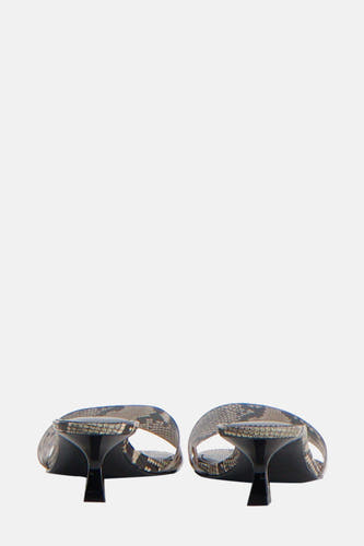 Beige sandalen van MANGO, met slangenprint en smalle hak.