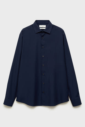 Chemise bleue à manches longues de MANGO, tissu uni avec fermeture boutonnée.