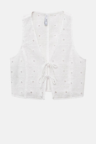 Blouse sans manches blanche de MANGO, avec un motif à encolure ouverte et une fermeture éclair.