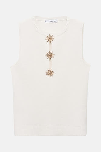 Blouse sans manches MANGO, avec des motifs décoratifs de soleils dorés sur une bande verticale.