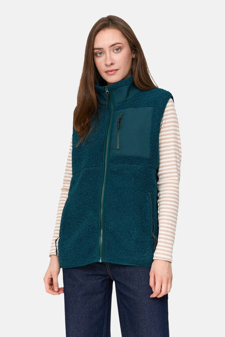 Gilet turquoise sans manches de 24 Colours GMBH, avec texture polaire et fermeture éclair à l'avant.