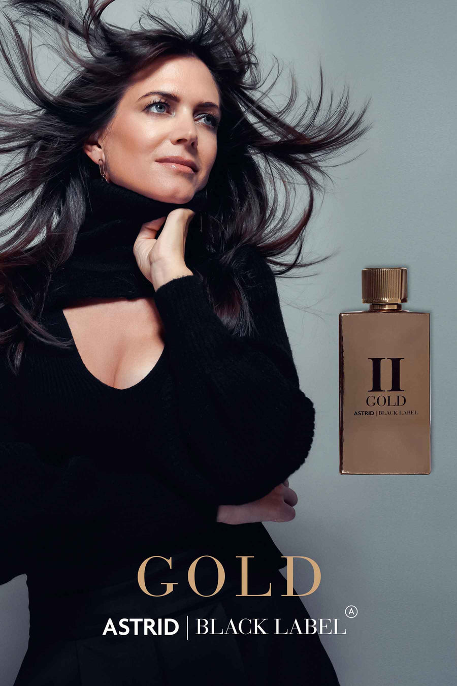 Bouteille de parfum dorée Astrid Black Label.