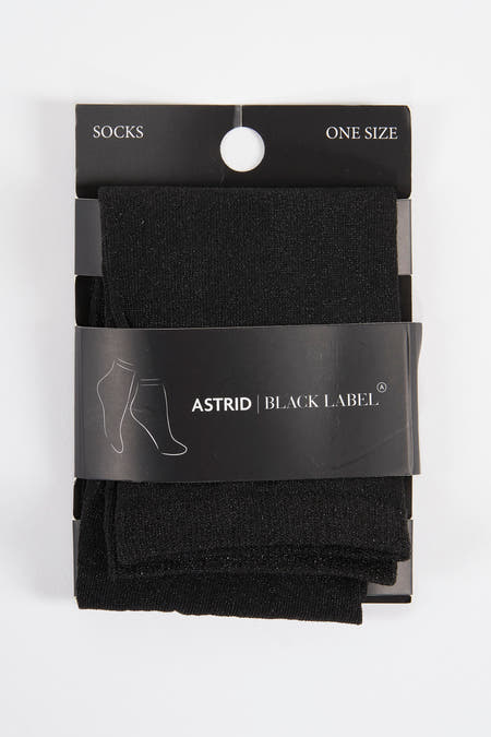 Chaussettes noires Astrid Black Black Label, avec des sub sub et une une blanche.