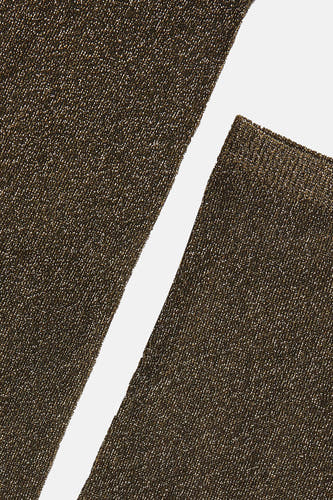Chaussettes vertes d'Astrid Black Label, avec des détails scintillants et une subtile texture.