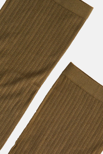 Chaussettes vertes d'Astrid Black Label, avec une texture rayée et une couleur lisse.