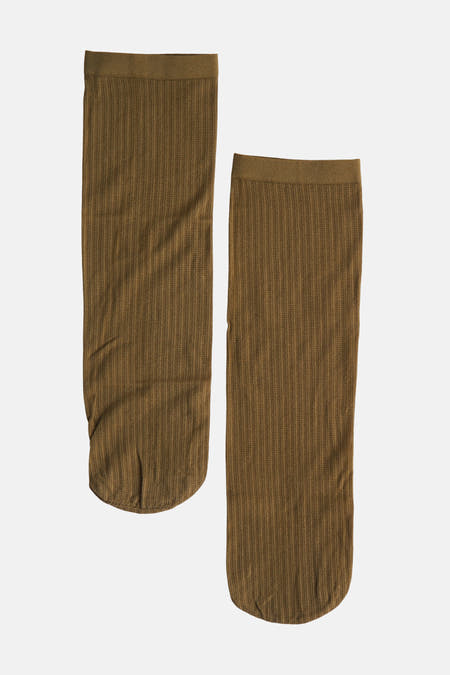 Chaussettes vertes d'Astrid Black Label avec une texture côtelée.